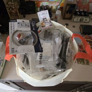 A Bundle of Forks, Spoons, Knives, Chop Sticks, Frying Strainer, Sink Strainer